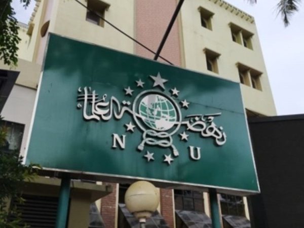 NU