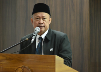 Prof. Komarudin